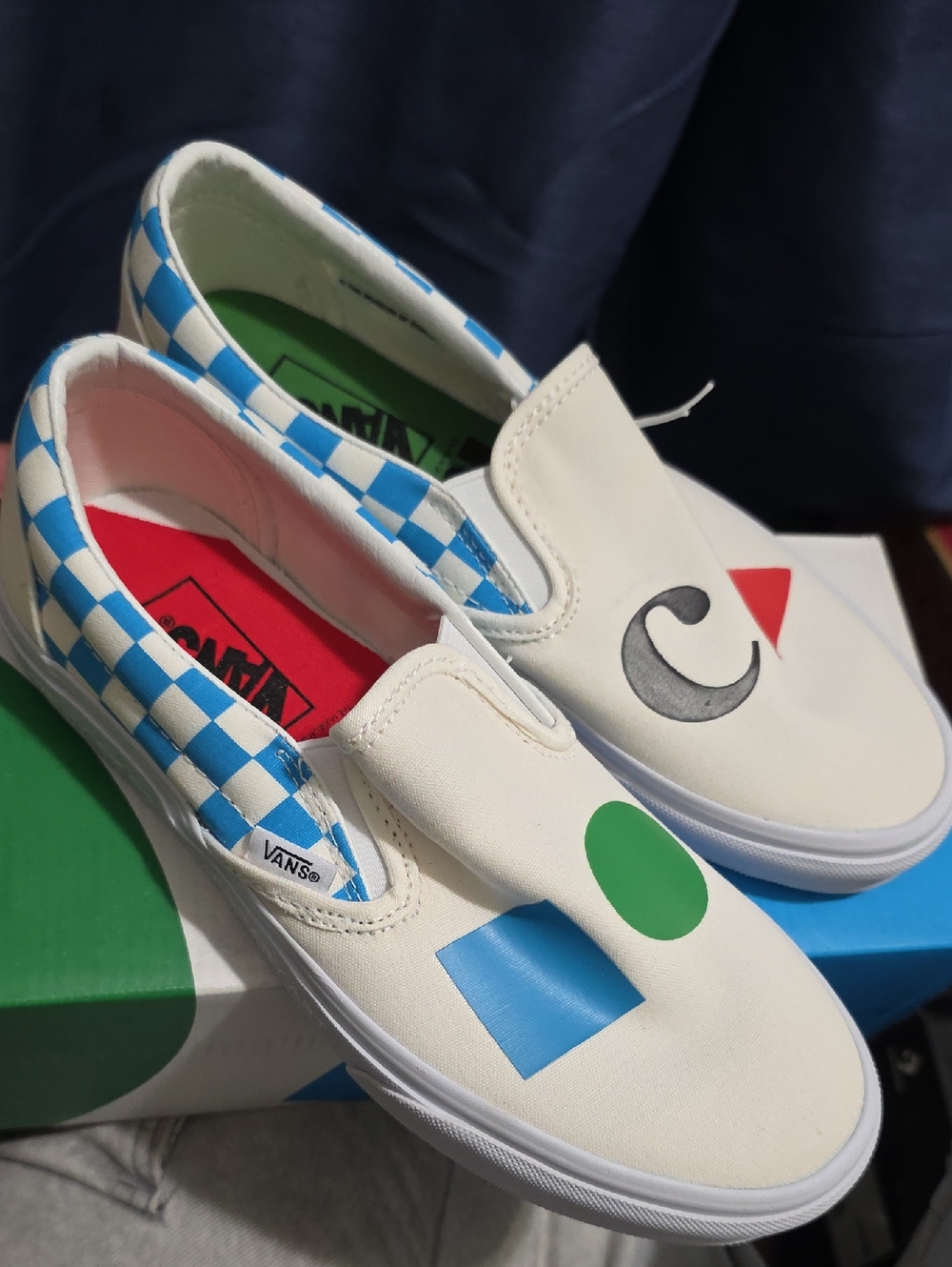 Vans Kids White Slip-On Sneakers with Blue Checker and Colorful Shapes